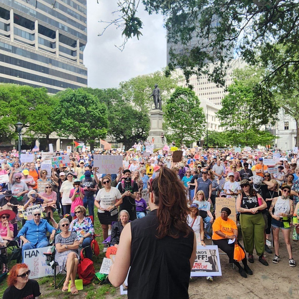 A crowd gathers at the Indivisible NOLA Hands Off 2025 protest